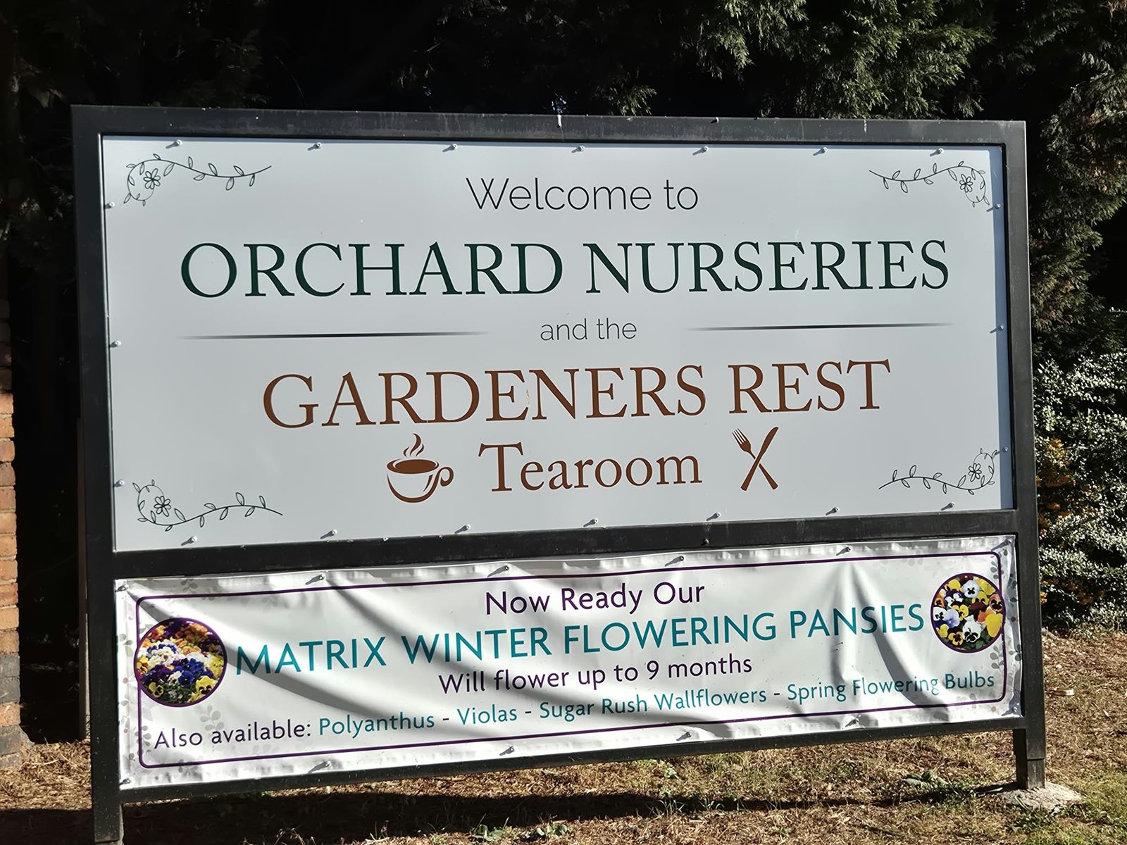 The Orchard Nurseries and Gardeners Rest welcome sign on Birmingham Road