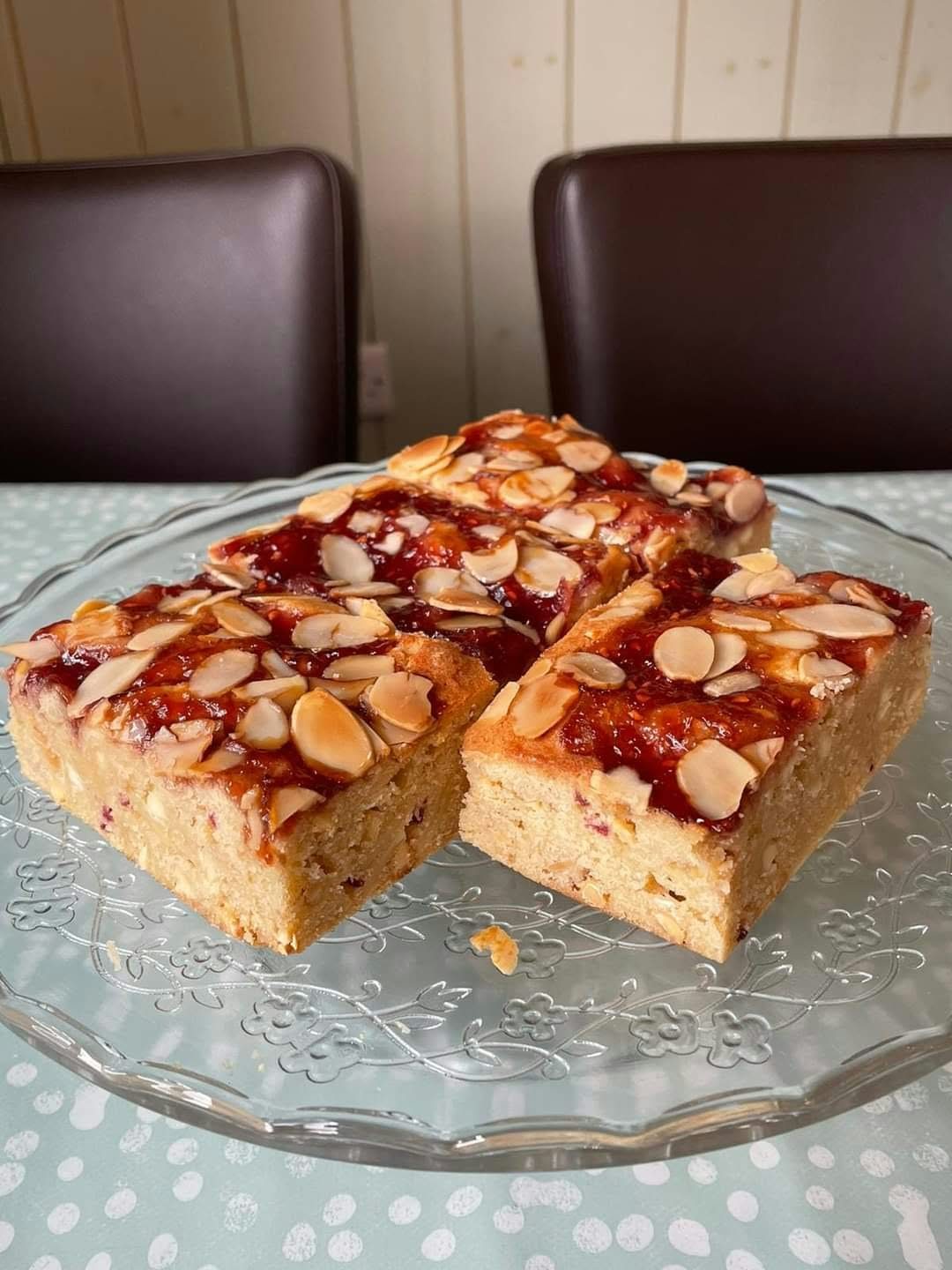 Bakewell slices on a glass stand