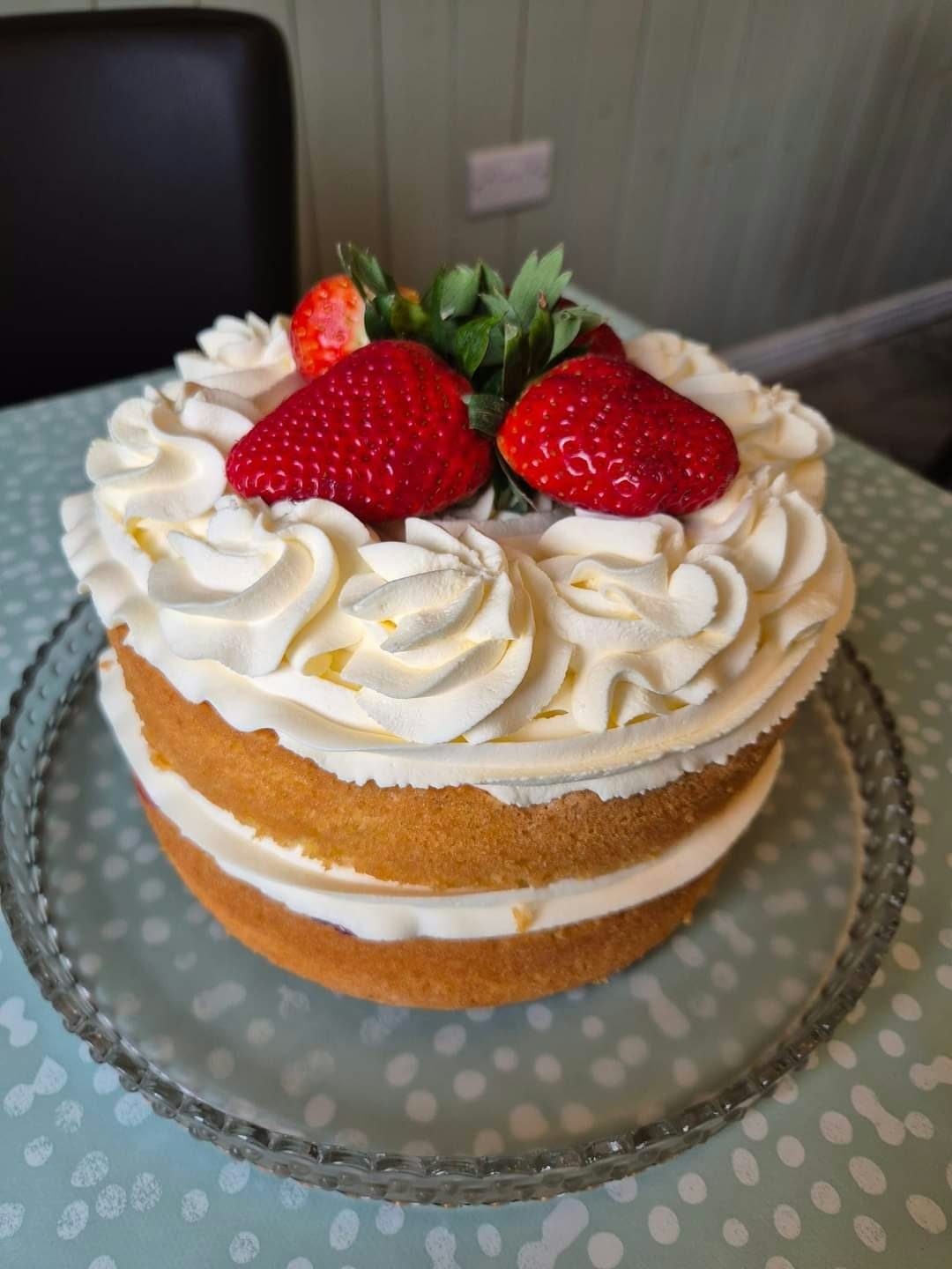 Strawberry topped homemade sponge cake