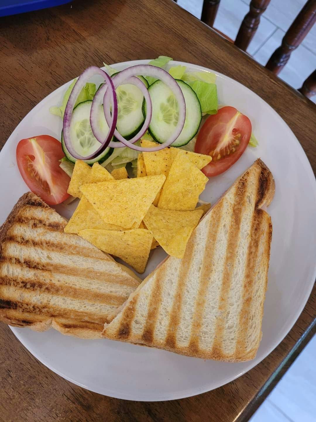 Toasties with crisps and salad